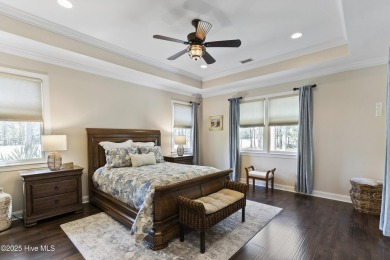 This amazing Mediterranean style home on the Egret 6th tee box on Carolina National Golf Club in North Carolina - for sale on GolfHomes.com, golf home, golf lot