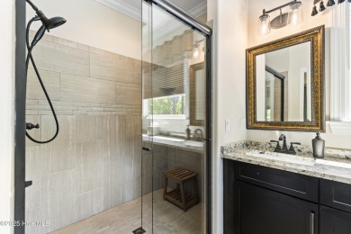 This amazing Mediterranean style home on the Egret 6th tee box on Carolina National Golf Club in North Carolina - for sale on GolfHomes.com, golf home, golf lot