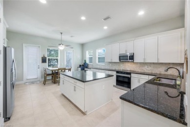 Welcome to this STUNNING two-story, three-car garage home in the on Valencia Golf and Country Club in Florida - for sale on GolfHomes.com, golf home, golf lot
