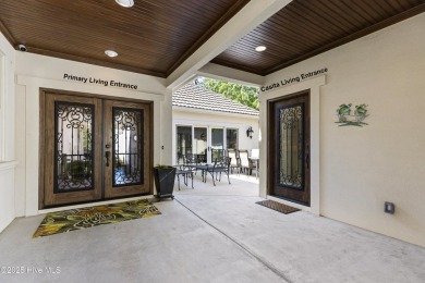 This amazing Mediterranean style home on the Egret 6th tee box on Carolina National Golf Club in North Carolina - for sale on GolfHomes.com, golf home, golf lot