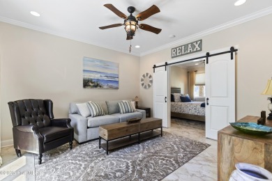 This amazing Mediterranean style home on the Egret 6th tee box on Carolina National Golf Club in North Carolina - for sale on GolfHomes.com, golf home, golf lot
