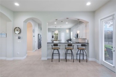 Welcome to this STUNNING two-story, three-car garage home in the on Valencia Golf and Country Club in Florida - for sale on GolfHomes.com, golf home, golf lot