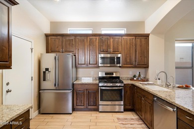 Welcome to this charming Presley-built home located in the on Legend Trail Golf Club in Arizona - for sale on GolfHomes.com, golf home, golf lot