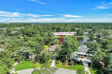 Timeless Lowcountry charm meets effortless luxury in the heart on Oldfield Golf Club in South Carolina - for sale on GolfHomes.com, golf home, golf lot