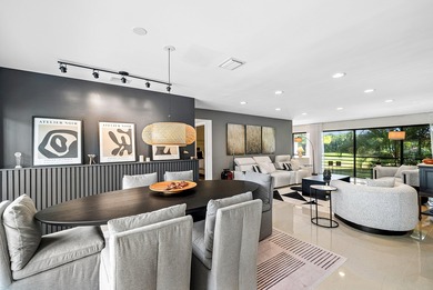 Beautifully updated 2nd-floor residence featuring bold color on Quail Ridge Golf Course and Country Club in Florida - for sale on GolfHomes.com, golf home, golf lot