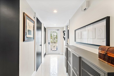 Beautifully updated 2nd-floor residence featuring bold color on Quail Ridge Golf Course and Country Club in Florida - for sale on GolfHomes.com, golf home, golf lot