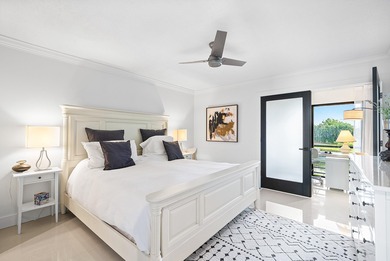 Beautifully updated 2nd-floor residence featuring bold color on Quail Ridge Golf Course and Country Club in Florida - for sale on GolfHomes.com, golf home, golf lot