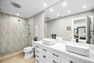 Beautifully updated 2nd-floor residence featuring bold color on Quail Ridge Golf Course and Country Club in Florida - for sale on GolfHomes.com, golf home, golf lot