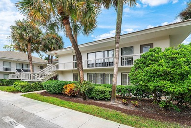 Beautifully updated 2nd-floor residence featuring bold color on Quail Ridge Golf Course and Country Club in Florida - for sale on GolfHomes.com, golf home, golf lot