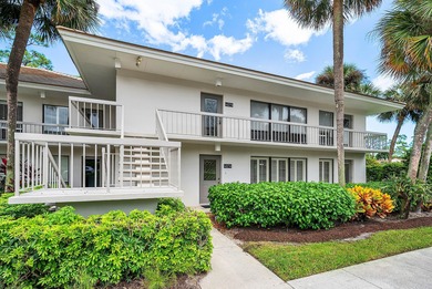 Beautifully updated 2nd-floor residence featuring bold color on Quail Ridge Golf Course and Country Club in Florida - for sale on GolfHomes.com, golf home, golf lot
