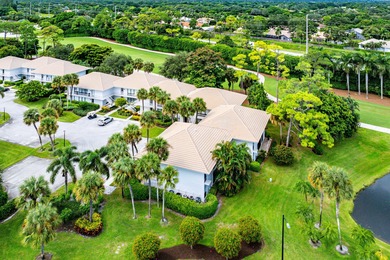 Beautifully updated 2nd-floor residence featuring bold color on Quail Ridge Golf Course and Country Club in Florida - for sale on GolfHomes.com, golf home, golf lot