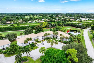 Beautifully updated 2nd-floor residence featuring bold color on Quail Ridge Golf Course and Country Club in Florida - for sale on GolfHomes.com, golf home, golf lot