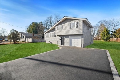 Step Into Your Dream Home! This stunning 3-bedroom, 1.5-bath on Island Hills Golf Club in New York - for sale on GolfHomes.com, golf home, golf lot