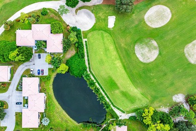Beautifully updated 2nd-floor residence featuring bold color on Quail Ridge Golf Course and Country Club in Florida - for sale on GolfHomes.com, golf home, golf lot