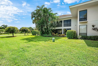 Beautifully updated 2nd-floor residence featuring bold color on Quail Ridge Golf Course and Country Club in Florida - for sale on GolfHomes.com, golf home, golf lot