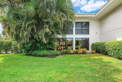 Beautifully updated 2nd-floor residence featuring bold color on Quail Ridge Golf Course and Country Club in Florida - for sale on GolfHomes.com, golf home, golf lot