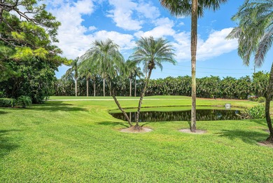 Beautifully updated 2nd-floor residence featuring bold color on Quail Ridge Golf Course and Country Club in Florida - for sale on GolfHomes.com, golf home, golf lot