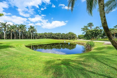 Beautifully updated 2nd-floor residence featuring bold color on Quail Ridge Golf Course and Country Club in Florida - for sale on GolfHomes.com, golf home, golf lot