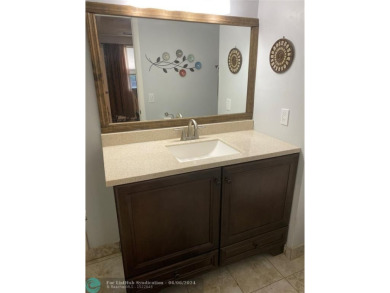 Welcome home to your beautiful turn key condo in the highly on Sunrise Lakes Phase IV Golf Course in Florida - for sale on GolfHomes.com, golf home, golf lot