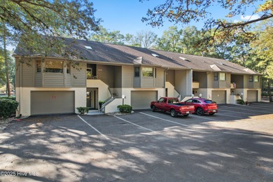 This golf-front, Clubhouse Villa in the vibrant community of Sea on Sea Trail Golf Resort in North Carolina - for sale on GolfHomes.com, golf home, golf lot