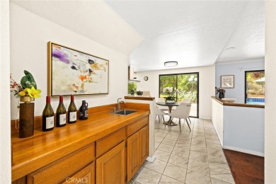 Nestled in West Covina's prestigious South Hills neighborhood on South Hills Country Club in California - for sale on GolfHomes.com, golf home, golf lot