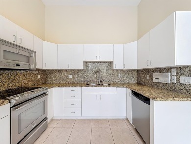 Charming and the largest available courtyard townhome with a on  in Florida - for sale on GolfHomes.com, golf home, golf lot