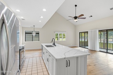 This golf-front, Clubhouse Villa in the vibrant community of Sea on Sea Trail Golf Resort in North Carolina - for sale on GolfHomes.com, golf home, golf lot