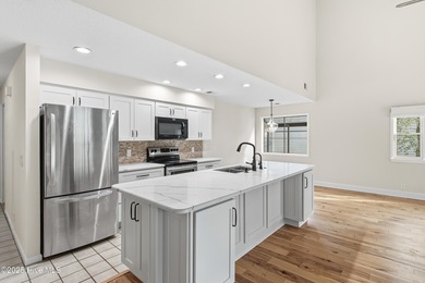 This golf-front, Clubhouse Villa in the vibrant community of Sea on Sea Trail Golf Resort in North Carolina - for sale on GolfHomes.com, golf home, golf lot