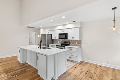 This golf-front, Clubhouse Villa in the vibrant community of Sea on Sea Trail Golf Resort in North Carolina - for sale on GolfHomes.com, golf home, golf lot