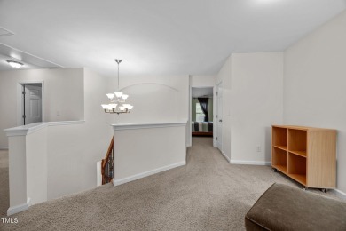 Welcome to this exquisite four-bedroom, three-bathroom home on Heritage Golf Club in North Carolina - for sale on GolfHomes.com, golf home, golf lot