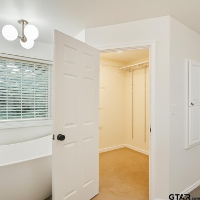 Welcome to 401 Hideaway Ln E -- a fully refreshed 3-bedroom on Hide-A-Way Lake Golf Course in Texas - for sale on GolfHomes.com, golf home, golf lot