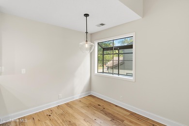 This golf-front, Clubhouse Villa in the vibrant community of Sea on Sea Trail Golf Resort in North Carolina - for sale on GolfHomes.com, golf home, golf lot