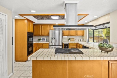 Nestled in West Covina's prestigious South Hills neighborhood on South Hills Country Club in California - for sale on GolfHomes.com, golf home, golf lot