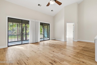 This golf-front, Clubhouse Villa in the vibrant community of Sea on Sea Trail Golf Resort in North Carolina - for sale on GolfHomes.com, golf home, golf lot