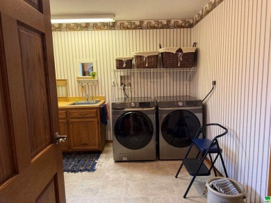 Let's take a look at 841 Country Club Dr. in Akron Iowa that's on Akron Golf Course in Iowa - for sale on GolfHomes.com, golf home, golf lot