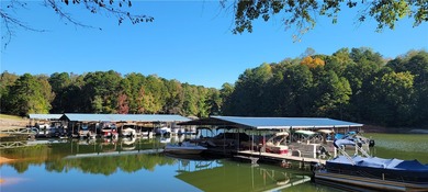 Rare mostly level double lot on Point road is now available for on The Trail At Chickasaw Pointe in South Carolina - for sale on GolfHomes.com, golf home, golf lot