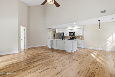 This golf-front, Clubhouse Villa in the vibrant community of Sea on Sea Trail Golf Resort in North Carolina - for sale on GolfHomes.com, golf home, golf lot