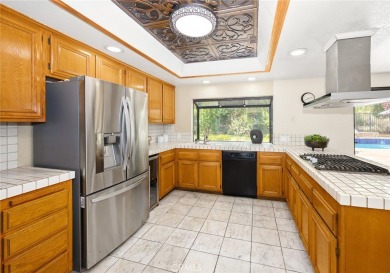 Nestled in West Covina's prestigious South Hills neighborhood on South Hills Country Club in California - for sale on GolfHomes.com, golf home, golf lot