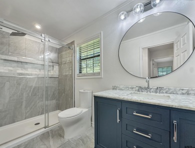 Welcome to 401 Hideaway Ln E -- a fully refreshed 3-bedroom on Hide-A-Way Lake Golf Course in Texas - for sale on GolfHomes.com, golf home, golf lot