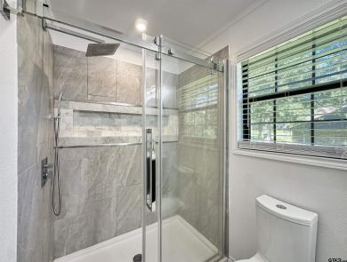 Welcome to 401 Hideaway Ln E -- a fully refreshed 3-bedroom on Hide-A-Way Lake Golf Course in Texas - for sale on GolfHomes.com, golf home, golf lot