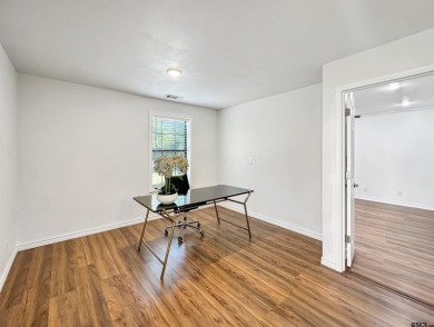 Welcome to 401 Hideaway Ln E -- a fully refreshed 3-bedroom on Hide-A-Way Lake Golf Course in Texas - for sale on GolfHomes.com, golf home, golf lot