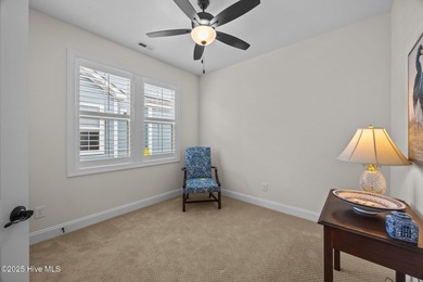 Welcome to this beautifully appointed home in the vibrant on Carolina Colours Golf Club in North Carolina - for sale on GolfHomes.com, golf home, golf lot