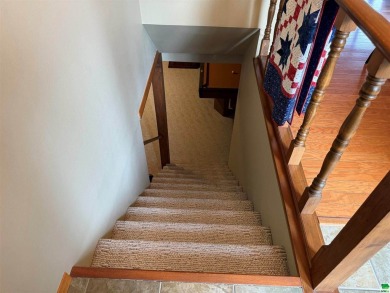 Let's take a look at 841 Country Club Dr. in Akron Iowa that's on Akron Golf Course in Iowa - for sale on GolfHomes.com, golf home, golf lot
