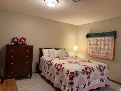 Let's take a look at 841 Country Club Dr. in Akron Iowa that's on Akron Golf Course in Iowa - for sale on GolfHomes.com, golf home, golf lot