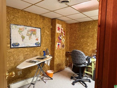 Let's take a look at 841 Country Club Dr. in Akron Iowa that's on Akron Golf Course in Iowa - for sale on GolfHomes.com, golf home, golf lot
