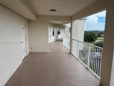 Spectacular Golf and Sunset views from this spacious 2/2 updated on Palm-Aire Country Club and Resort - The Oaks in Florida - for sale on GolfHomes.com, golf home, golf lot