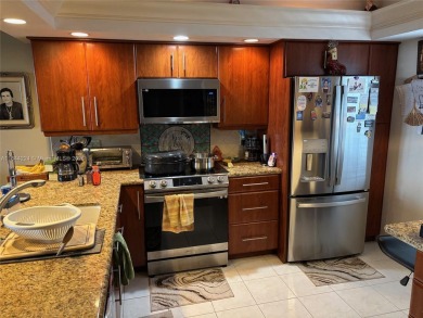 Spectacular Golf and Sunset views from this spacious 2/2 updated on Palm-Aire Country Club and Resort - The Oaks in Florida - for sale on GolfHomes.com, golf home, golf lot