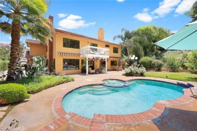 Nestled in West Covina's prestigious South Hills neighborhood on South Hills Country Club in California - for sale on GolfHomes.com, golf home, golf lot
