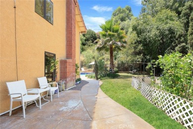 Nestled in West Covina's prestigious South Hills neighborhood on South Hills Country Club in California - for sale on GolfHomes.com, golf home, golf lot