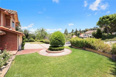 Nestled in West Covina's prestigious South Hills neighborhood on South Hills Country Club in California - for sale on GolfHomes.com, golf home, golf lot